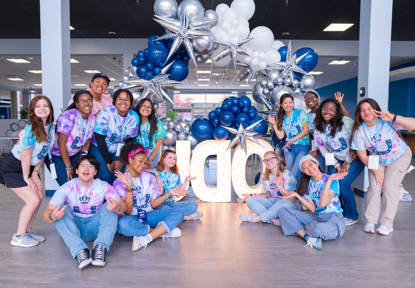 group of odu students under a balloon arch